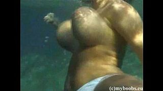Busty Lesbian under water