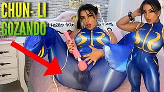 Sexy cosplay girl dressed as Chun Li from street fighter playing with her htachi vibrator cumming and soaking her panties and pants ahegao