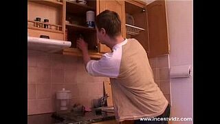 Mature and young guy on the kitchen